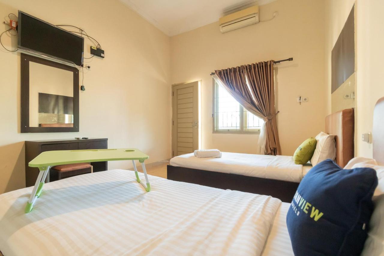 Urbanview Hotel Nugraha Palembang By Reddoorz Buitenkant foto